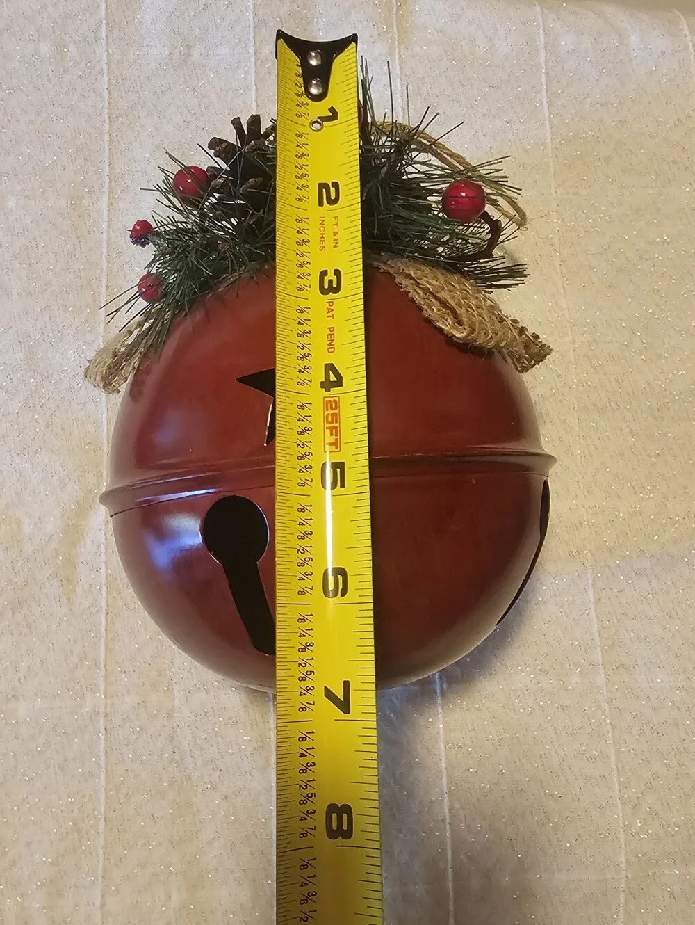 Large Rustic Red Bell Christmas Decor with Star Cutouts & Burlap Bow